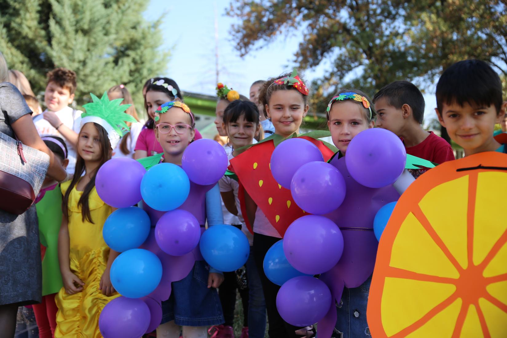 A group of children dressed in a different fruit types during the World Food Day Celebration